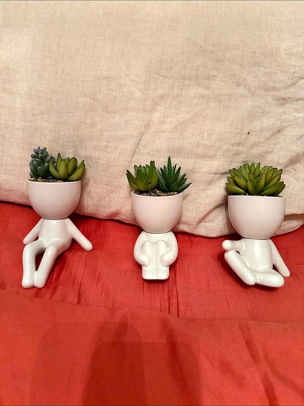 White & Green Figure Planters with Faux Succulents